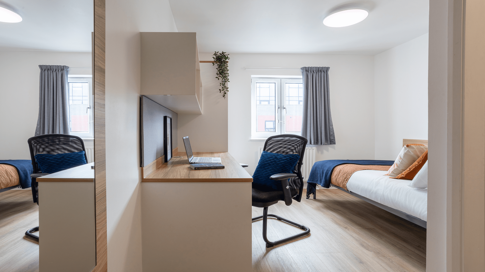 Silver Ensuite Room showing desk and room space
